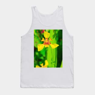 Yellow red lily blossom on green background Tank Top